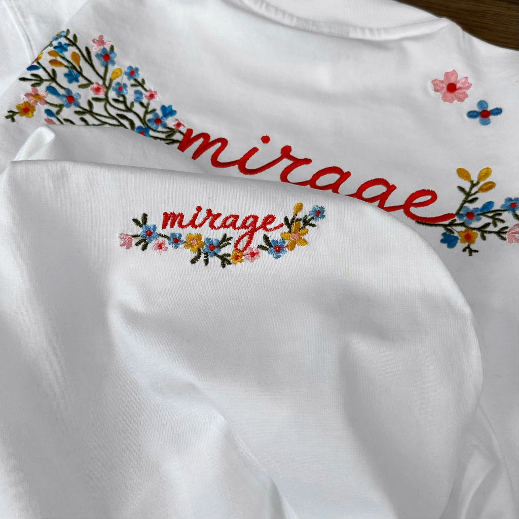 Áo Thun Mirage Thêu Chữ Hoa Màu Trắng Nghệ Thuật, Chất 100% Cotton Mềm Mịn Thoáng Mát.