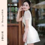 Váy trắng tay bồng cổ nơ đính hoa eo dáng ngắn sang trọng Jolie