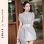 Váy trắng tay bồng cổ nơ đính hoa eo dáng ngắn sang trọng Jolie