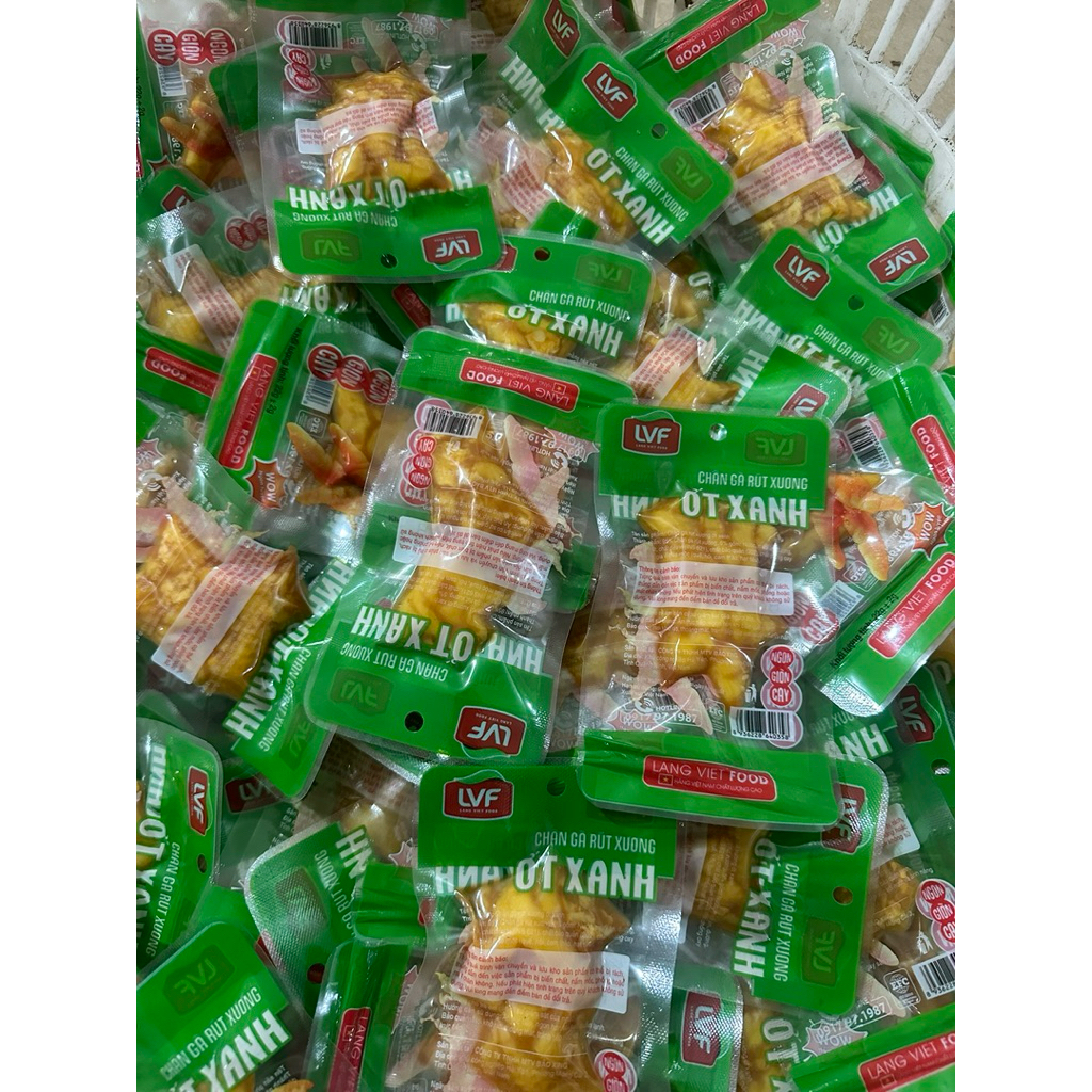COM 30 chân gà rút xương ớt xanh ngon giòn cay 22 gam trên 1 bịch (Túi Trong Màu Xanh)