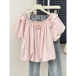 Áo bí nữ cổ thuyền trễ vai tay bồng tiểu thư BOY phối nơ hoa rời cổ viền chun hàng Quảng Châu.