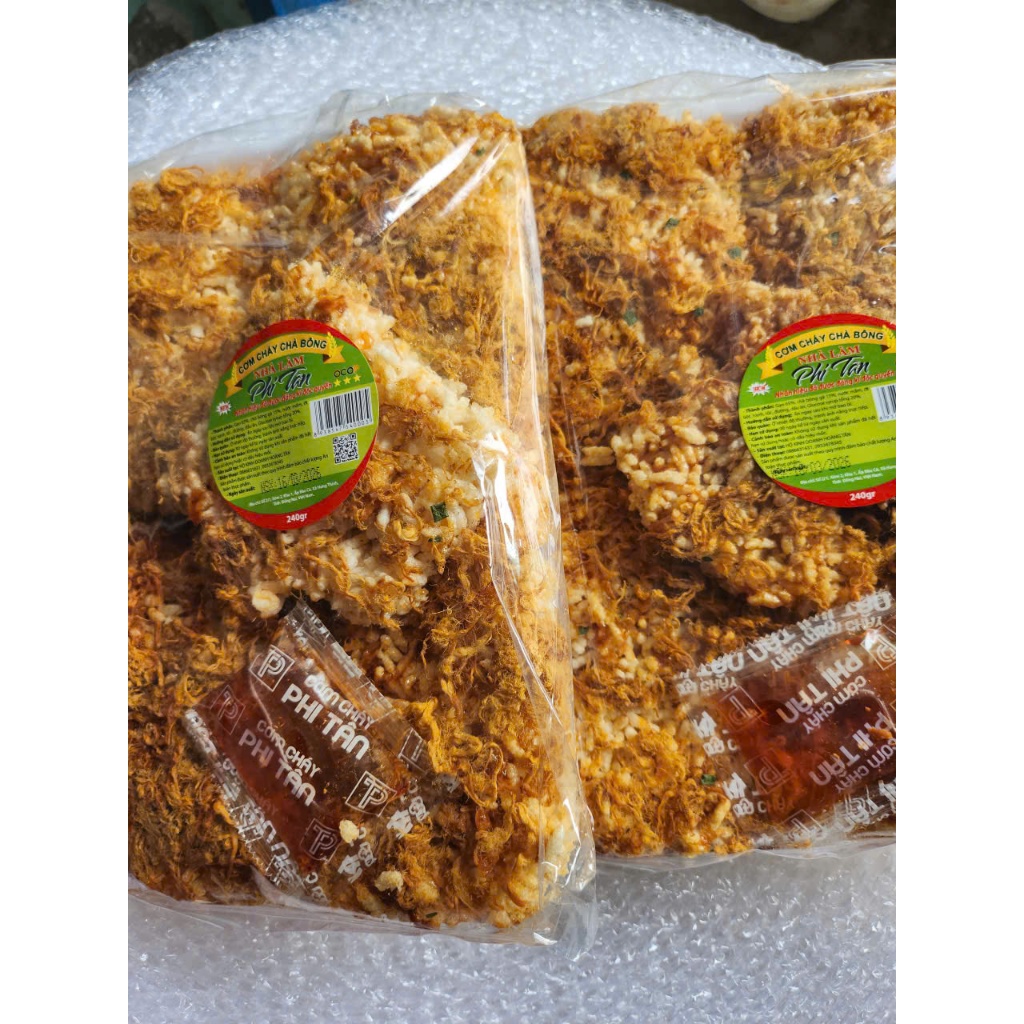 (Giá sỉ) - 01 gói Cơm cháy siêu chà bông,giòn tan thơm ngon Tặng kèm tương ớt.