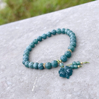 Vòng ngọc lam mix charm cỏ 4 lá