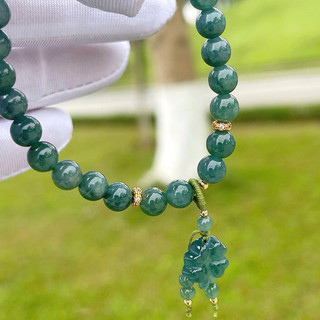 Vòng ngọc lam mix charm cỏ 4 lá