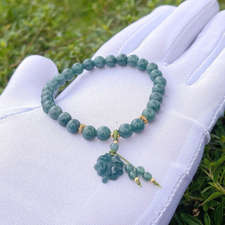 Vòng ngọc lam mix charm cỏ 4 lá