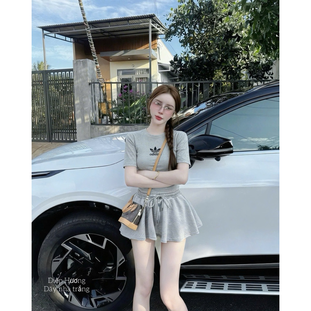 Set Bộ Áo Thun Pozip Tay Ngắn In Chữ + Chân Váy Bí Xoè Có Lót Quần