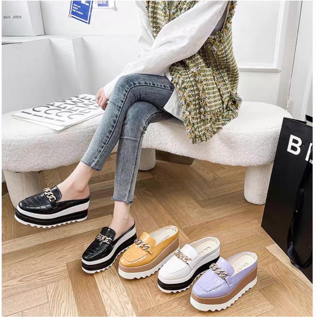 Giày sục đế cao nữ