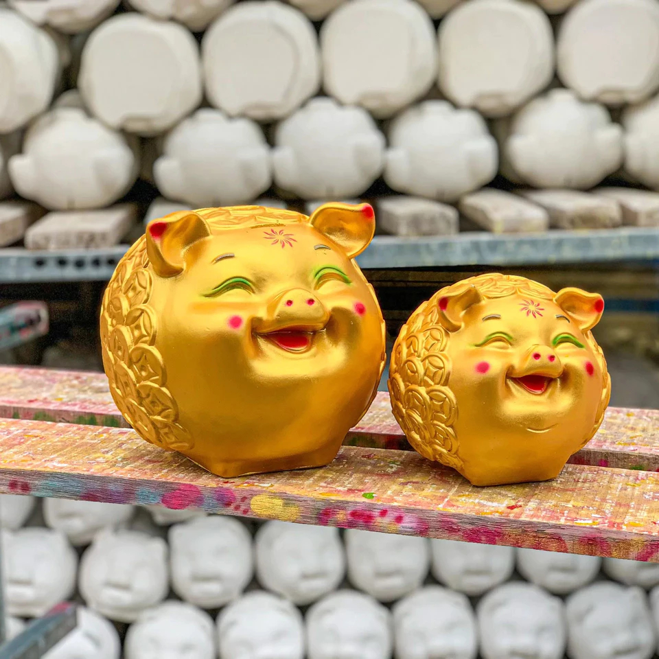 Heo đất Maison mẫu Híp Đồng Xu