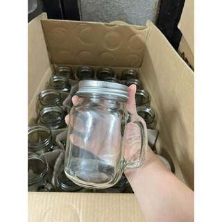 Cốc thuỷ tinh  500 ml có  quai , nắp kín đậy