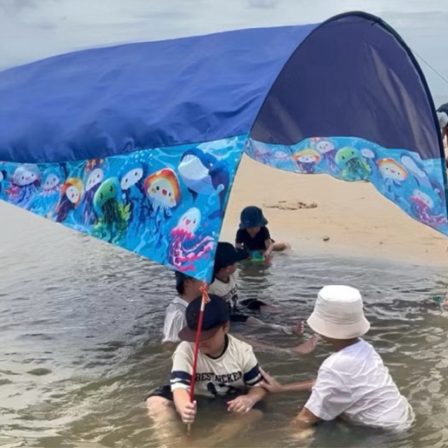 Lều bay đi biển CHỐNG UV IN CÁNH HOẠT HÌNH ( Khung đỏ 11ly )
