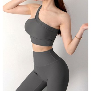 Áo thể thao nữ không tay, có lót ngực, kiểu dáng chéo vai một bên, vải có gân co giãn, 90% Nylon 10% Spandex BRC-TRINITY