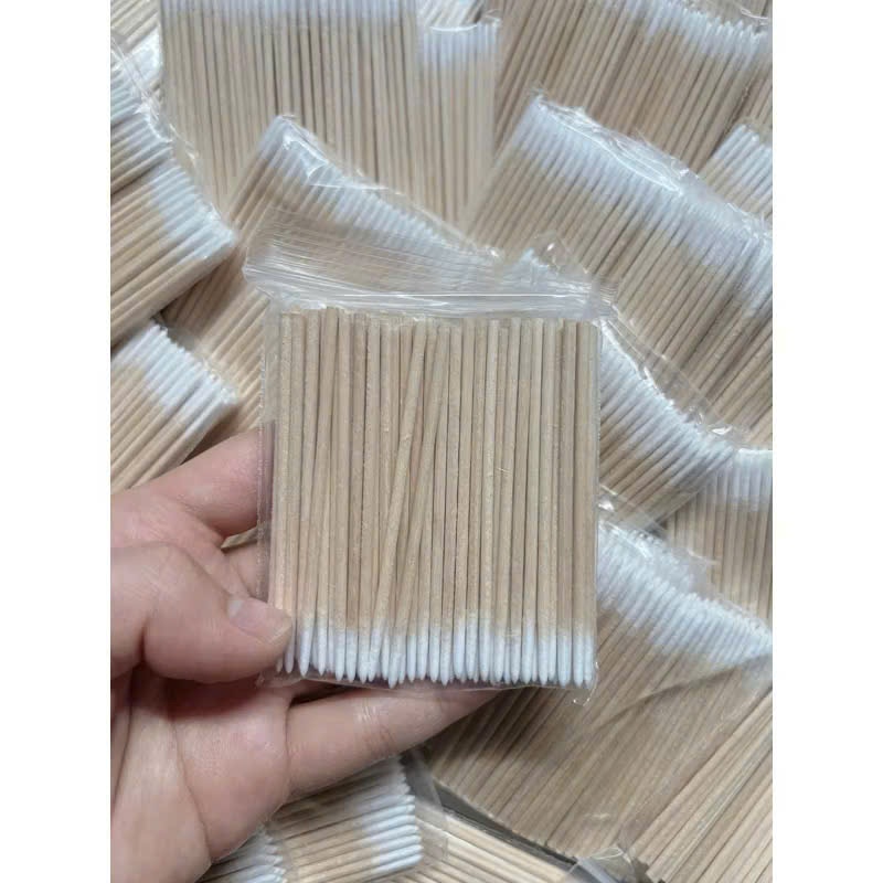 Tăm bông cán gỗ (gói 100c )ủ tê phun xăm mày môi,uốn mi,chăm sóc móng tay,làm đẹp
