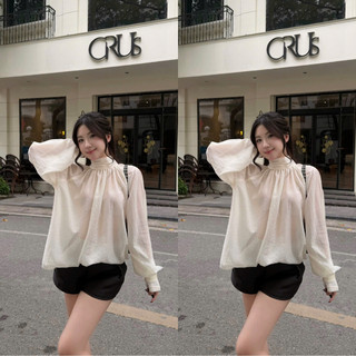 Áo kiểu trắng cổ cao thắt nơ sau tay bồng bềnh phối quần short