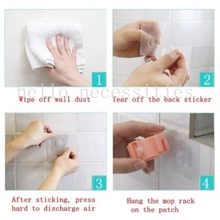 Móc dán tường giữ cây lau nhà / treo chổi chịu lực tốt không thấm nước .