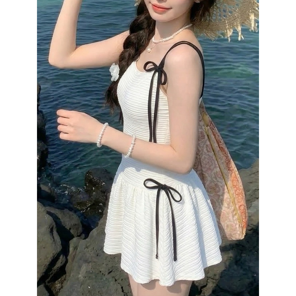 Váy Bơi 1 Mảnh Dáng Xòe Màu Trắng Phối Dây Nơ Đen Bikini Liền Thân Nữ Chất Vải Gân Tôn Dáng Tiểu Thư Cao Cấp