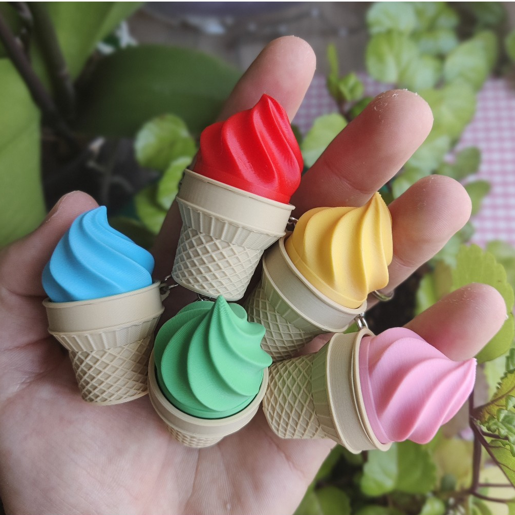 Móc khóa Clicker kem ốc quế giảm stress – đồ chơi bấm tay thư giãn cực vui