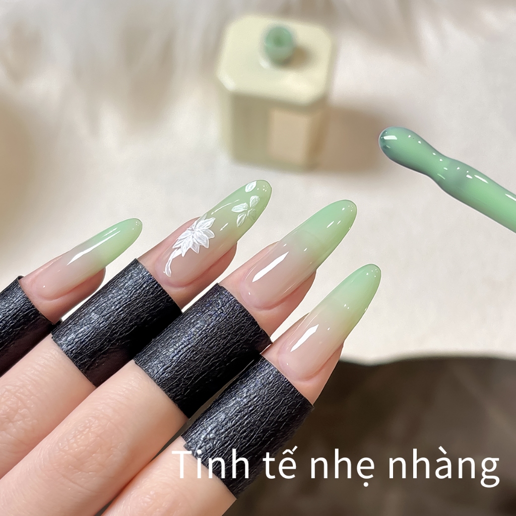 XEIJAYI 40ml - Sơn móng tay dạng gel màu xanh lá nhạt, bền màu và phù hợp với mọi tông da.