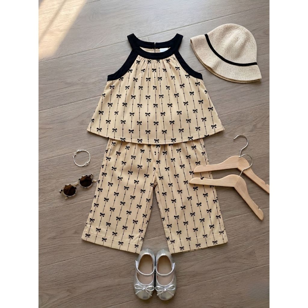 Bộ quần áo lụa cho bé gái cổ yếm sz 14-43kg dáng babydoll in nơ xinh xắn dễ thương mùa hè 2026 H89