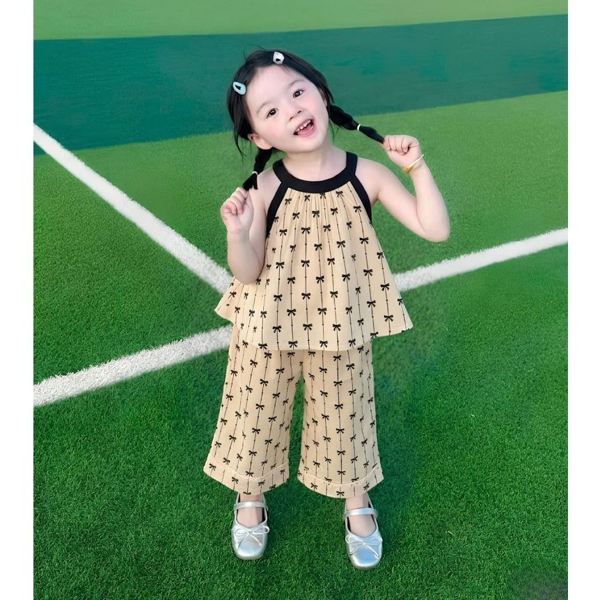 Bộ quần áo lụa cho bé gái cổ yếm sz 14-43kg dáng babydoll in nơ xinh xắn dễ thương mùa hè 2026 H89