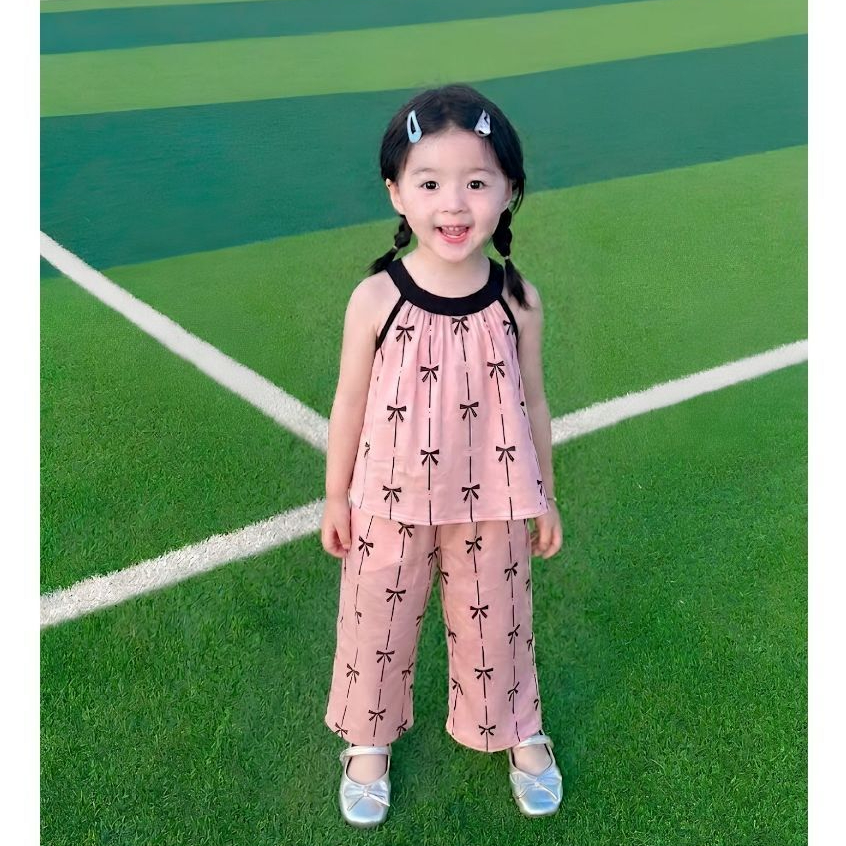 Bộ quần áo lụa cho bé gái cổ yếm sz 14-43kg dáng babydoll in nơ xinh xắn dễ thương mùa hè 2026 H89