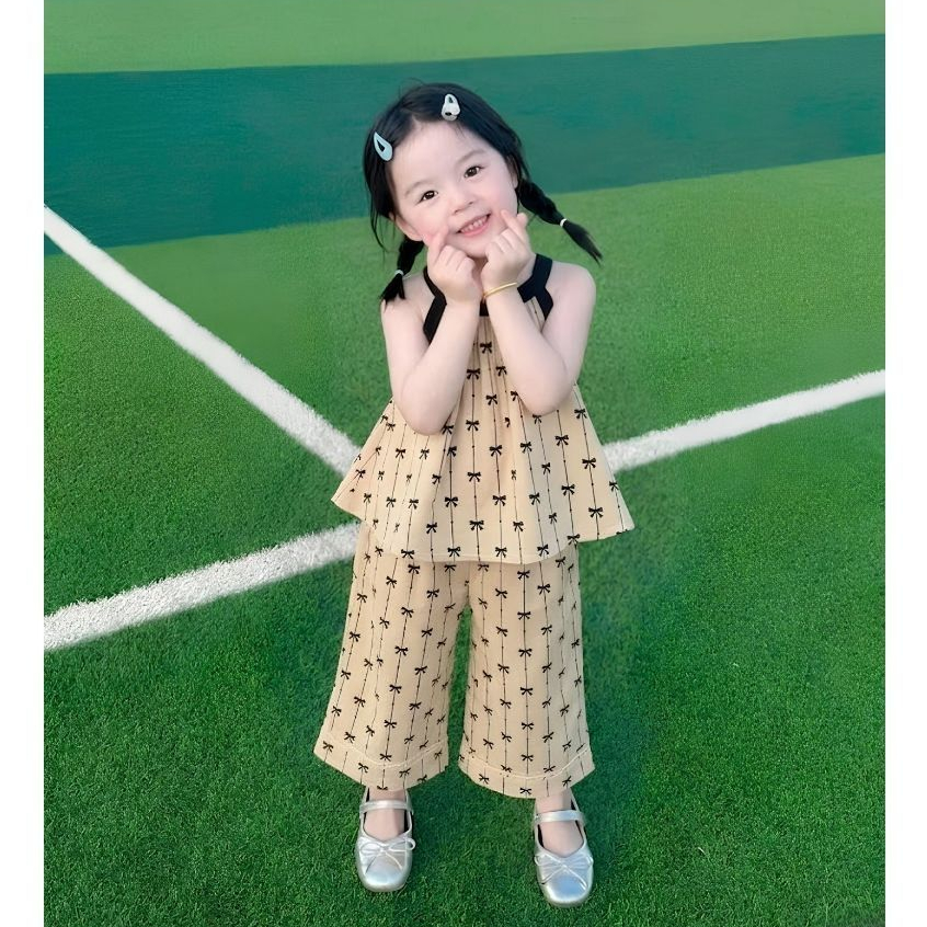 Bộ quần áo lụa cho bé gái cổ yếm sz 14-43kg dáng babydoll in nơ xinh xắn dễ thương mùa hè 2026 H89