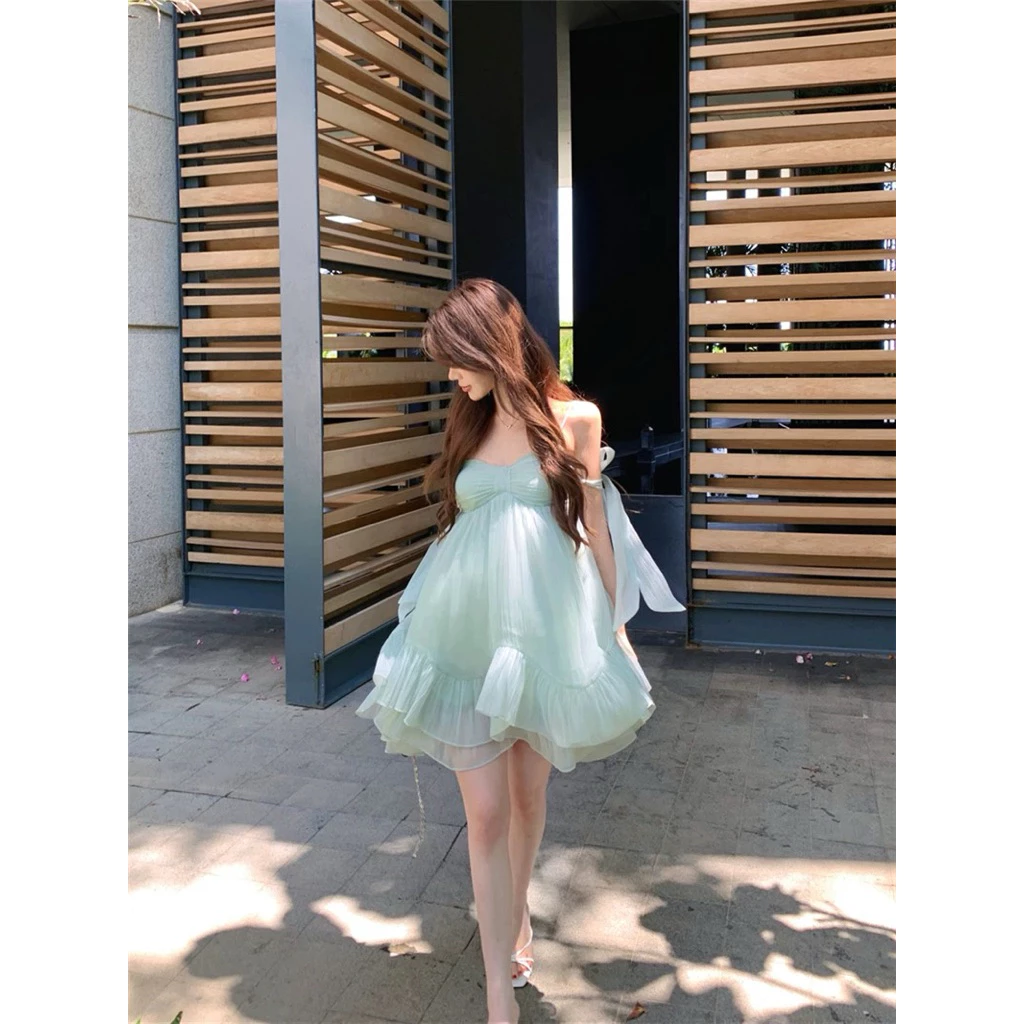 TIBU - Đầm Babydoll Hai Dây Tay Buộc Nơ Hở Lưng Dễ Thương Đi Chơi Biển Mùa Hè D738 ảnh 4