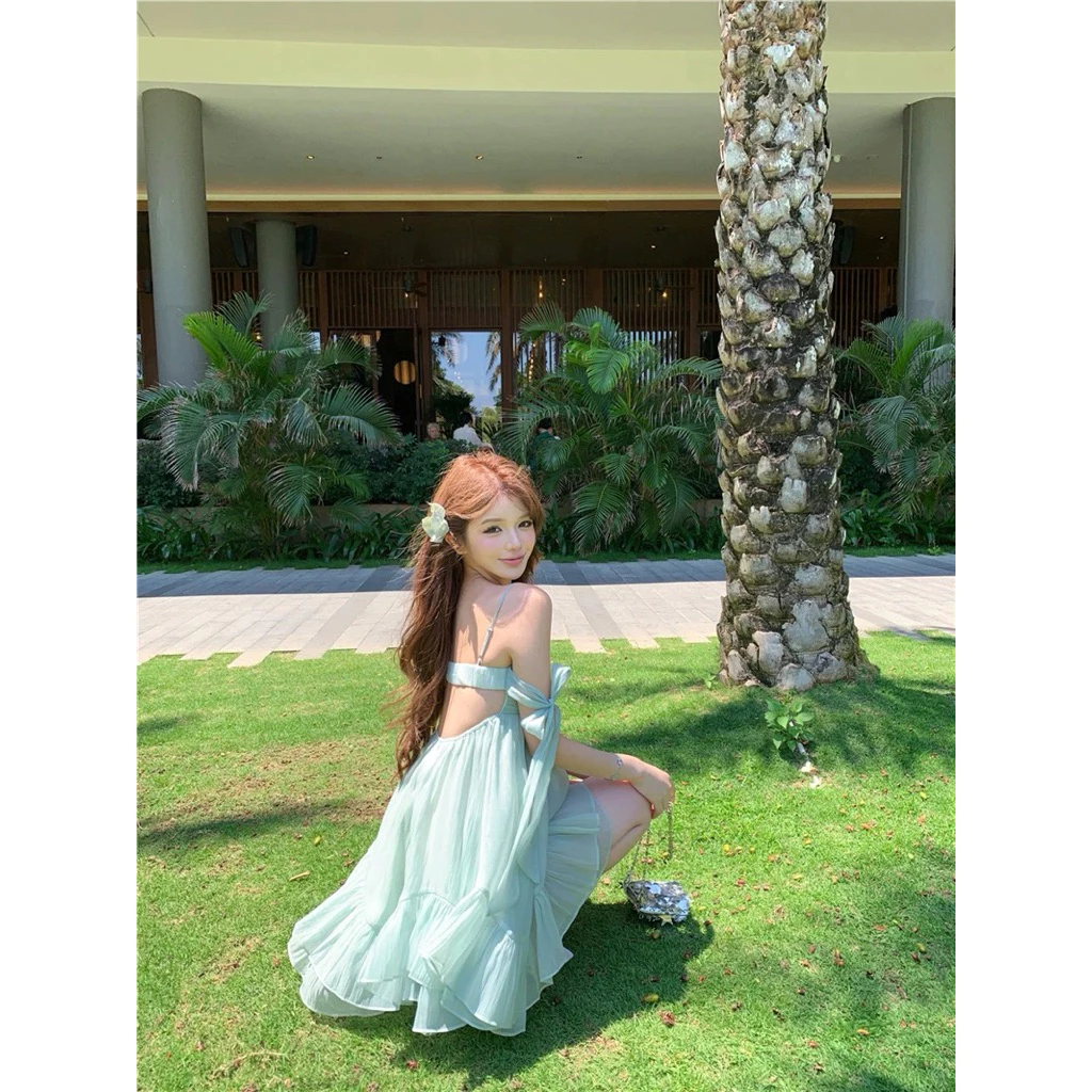 TIBU - Đầm Babydoll Hai Dây Tay Buộc Nơ Hở Lưng Dễ Thương Đi Chơi Biển Mùa Hè D738 ảnh 3