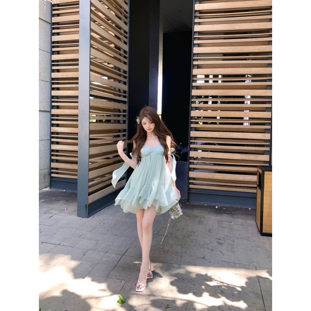 TIBU - Đầm Babydoll Hai Dây Tay Buộc Nơ Hở Lưng Dễ Thương Đi Chơi Biển Mùa Hè D738