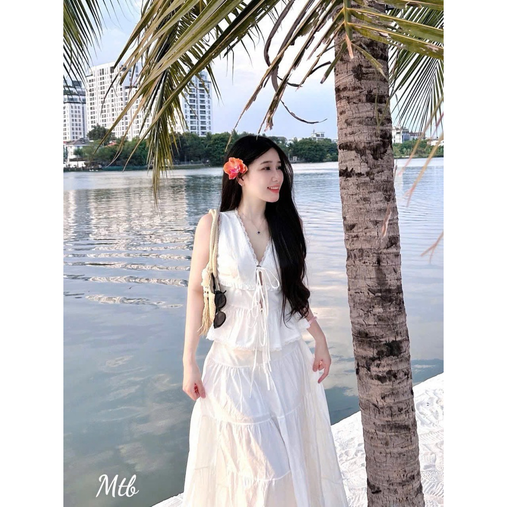 Set áo kiểu sát nách thắt nơ ngực phối chân váy dài xẻ tà màu trắng Set đồ nữ dễ thương mặc đi biển đi chơi
