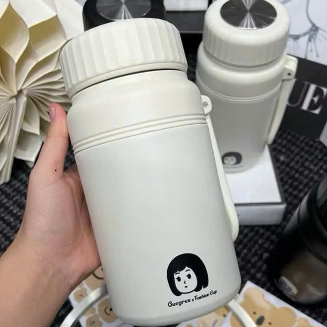 Bình giữ nhiệt dung tích 1000ml có quai cầm tiện lợi , inox 316 có khay lọc trà 12
