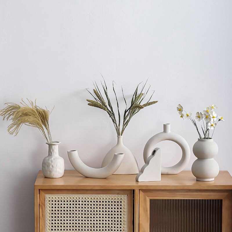 Bộ tượng các mẫu bình lọ hoa gốm sứ trắng decor nhà cửa