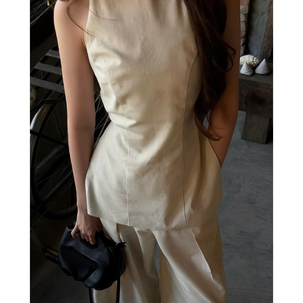 NH CLOTHER -Set đồ màu kem áo sát nách xẻ tà hở lưng thắt nơ phối quần ống suông dài