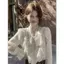 Áo blouse nữ bèo nhún cổ nơ họa tiết tim phong cách Hàn Quốc form rộng tiểu thư