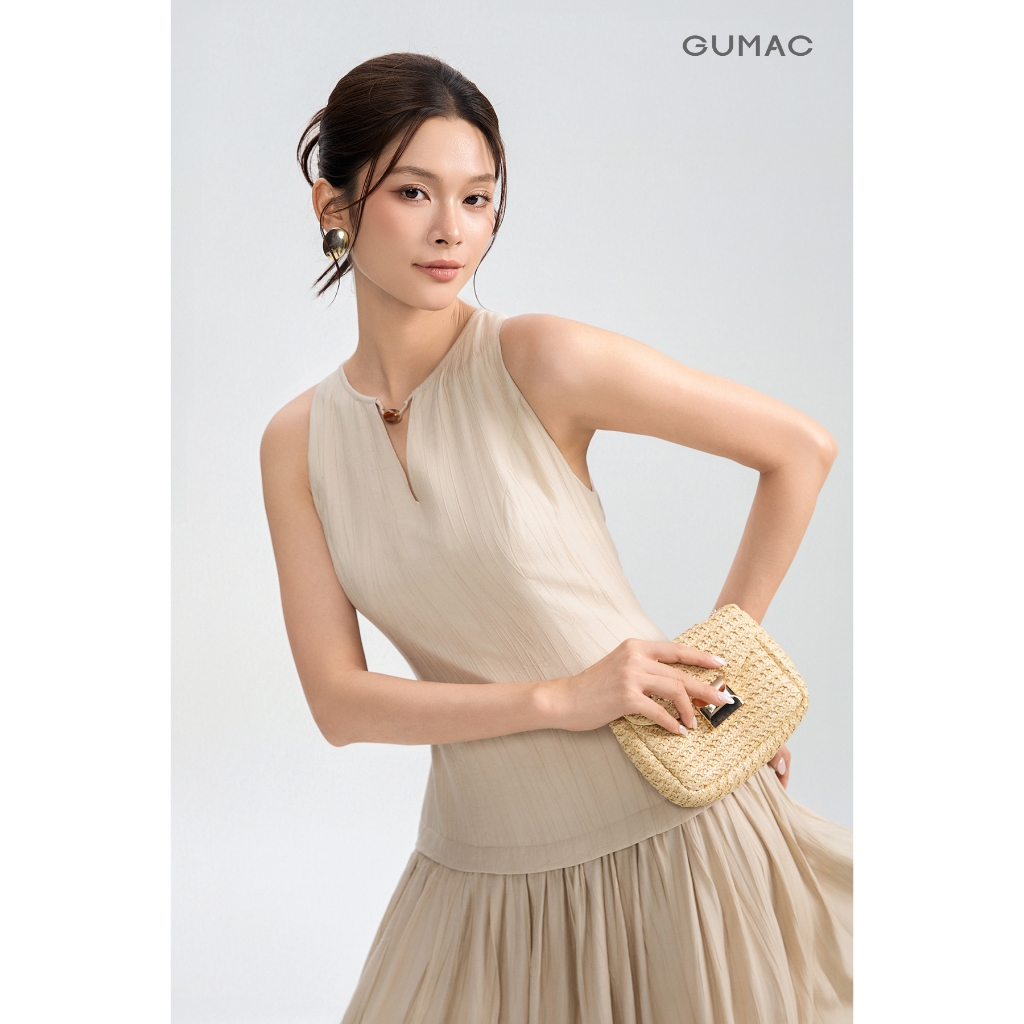 Đầm Nữ GUMAC Cổ Yếm Sát Nách Form A Xòe Dây Kéo Giọt Nước Phía Sau DG04095