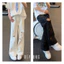 Quần jean ống thẳng rộng unisex họa tiết phun sơn màu nghệ thuật đường phố rách lỗ bất quy tắc có 2 màu đen trắng độc đá