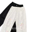 Quần jean ống thẳng rộng unisex họa tiết phun sơn màu nghệ thuật đường phố rách lỗ bất quy tắc có 2 màu đen trắng độc đá