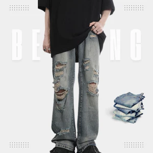Quần jean ống thẳng rộng unisex phong cách Grunge Đất Hoang hiệu ứng giặt cũ màu phai cổ điển lỗ rách và viền lông phong