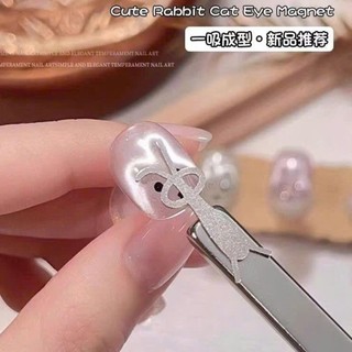 nam châm tai thỏ hơ mắt mèo
