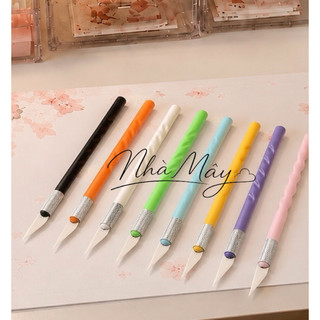 Dao rọc giấy cắt giấy cán nhựa nhiều màu, dao trổ waship tape stricker , cạo hạy đều . Đính đá tranh đính đá k cần sáp