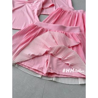 Sét thể thao hồng cộc tay kèm chân váy ly nhỏ ngắn