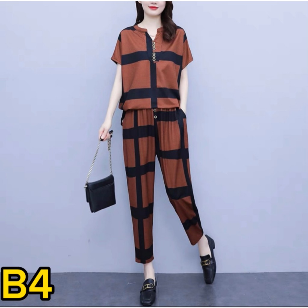 Mẫu Bộ Nữ -  Tay ngắn, quần 9 tấc, phom dáng suông, thiết kế thêm dây thít bằng vải mặc được nhiều kiểu dáng.