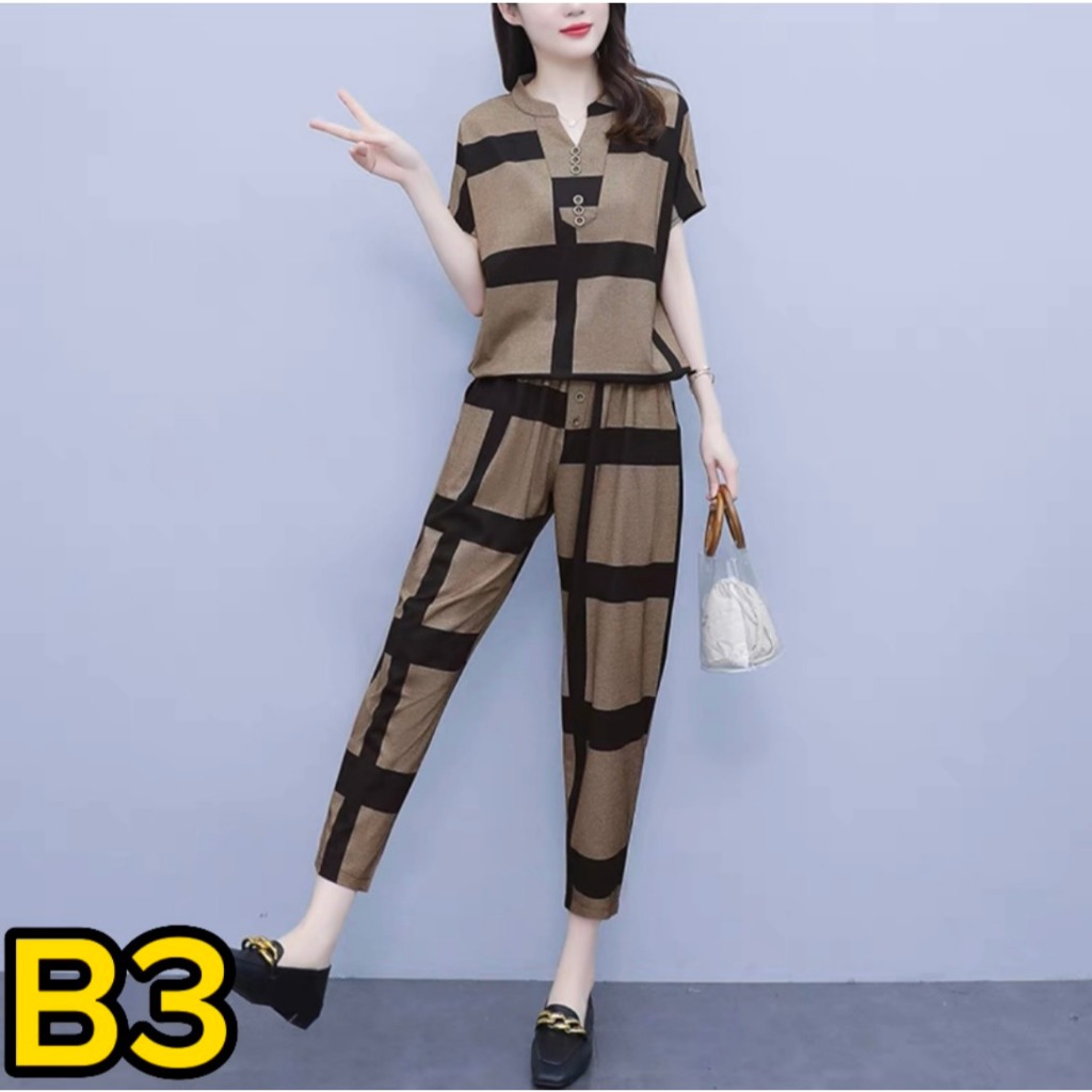 Mẫu Bộ Nữ -  Tay ngắn, quần 9 tấc, phom dáng suông, thiết kế thêm dây thít bằng vải mặc được nhiều kiểu dáng.