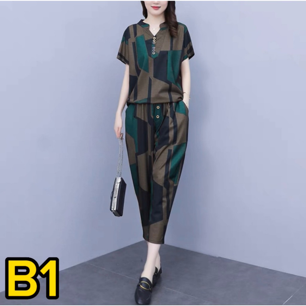 Mẫu Bộ Nữ -  Tay ngắn, quần 9 tấc, phom dáng suông, thiết kế thêm dây thít bằng vải mặc được nhiều kiểu dáng.