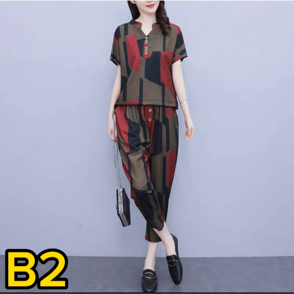Mẫu Bộ Nữ -  Tay ngắn, quần 9 tấc, phom dáng suông, thiết kế thêm dây thít bằng vải mặc được nhiều kiểu dáng.