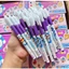 HỘP 20 CÂY BÚT MỰC TÍM THIÊN LONG DOREMON