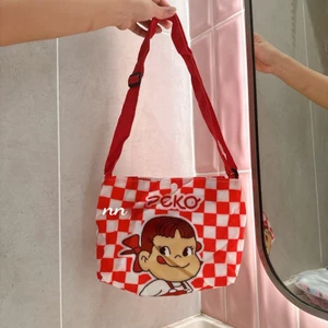 TÚI ĐEO CHÉO HOẠT HÌNH BÉ TRAI - GÁI 21cm giao ngẫu nhiên màu