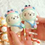 Móc Khoá Len Nhung Mèo Trắng Kitty Đội Mũ Trái Cây Đeo Túi Chéo Balo Haste Dễ Thương Handmade