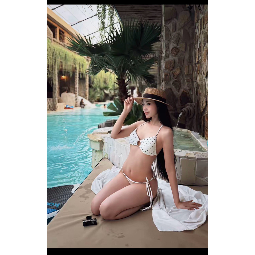 Tina bikini set 2 món tam giác chấm bi cực xinh,chất vải thun tăm co dãn 4 chiều .Mã 0334