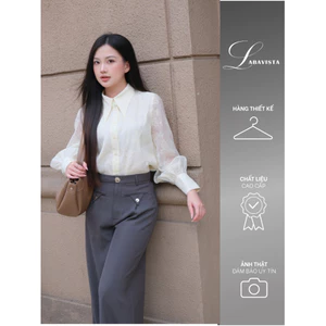 LABAVISTA Áo sơ mi nữ cổ nhọn tay phồng form suông màu kem pastel chất tơ họa tiết hoa thanh lịch