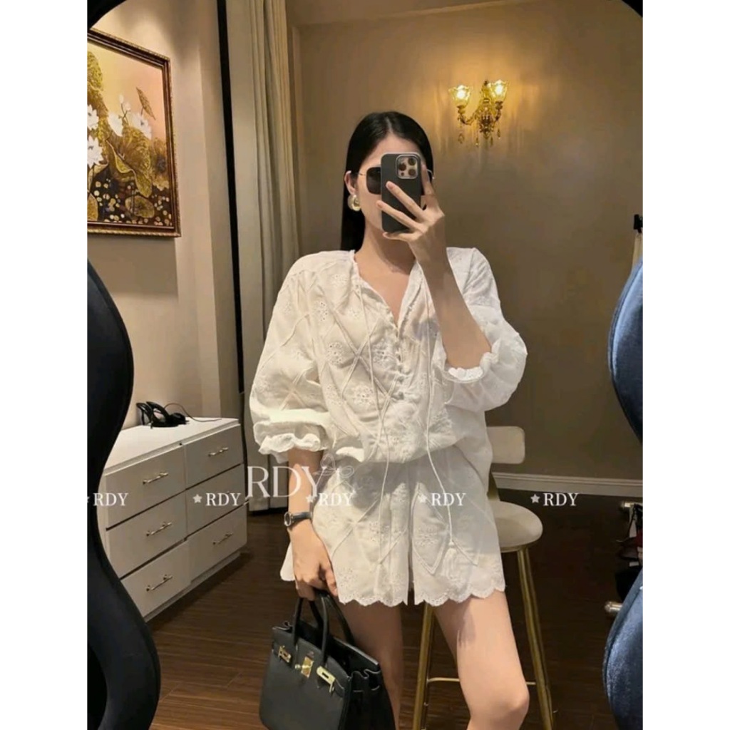 Set Bộ Đũi Thêu Đục Lỗ Áo Dài Tay Thắt Nơ Kèm Quần Short Giả Váy Đi Biển Xinh - CHAMIE STUDIO